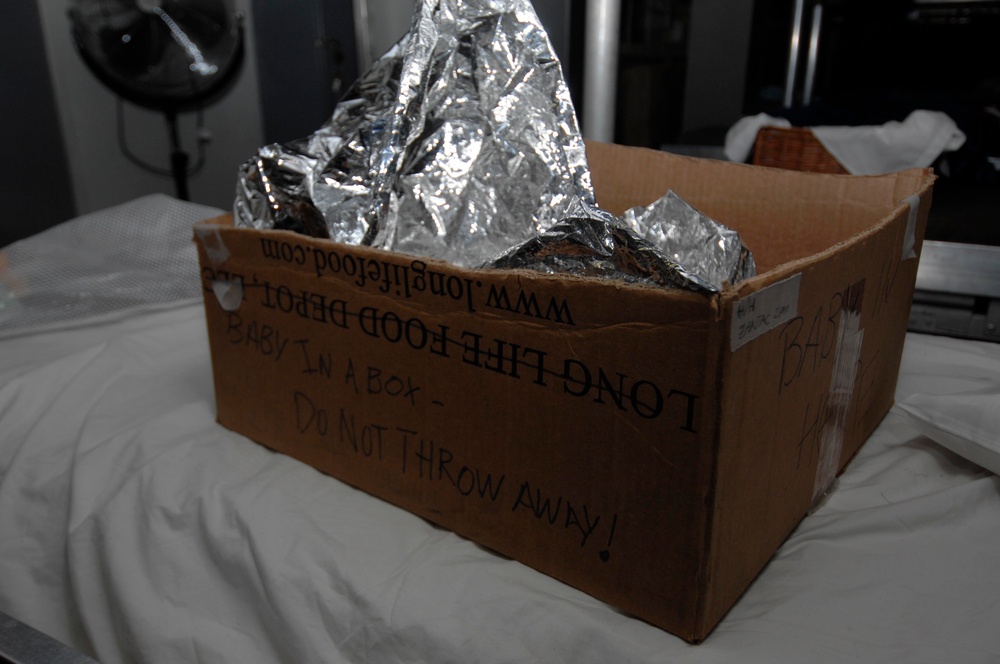 Sailors protect Haitian infant