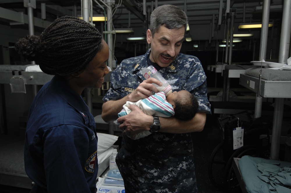 Sailors protect Haitian infant