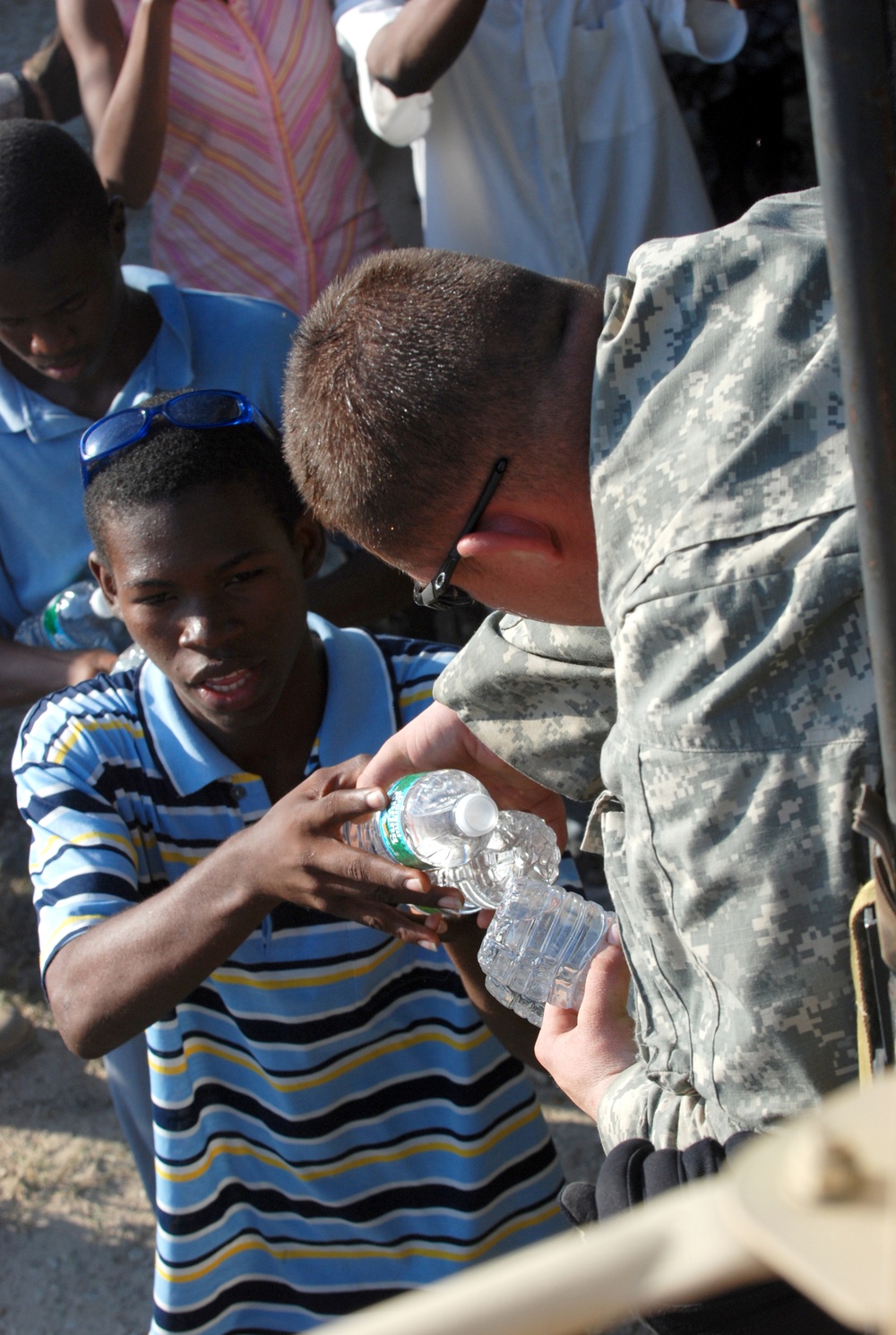 2-319th, Black Falcons, Deliver Much Needed Food and Water in Port-au-Prince