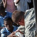 2-319th, Black Falcons, Deliver Much Needed Food and Water in Port-au-Prince