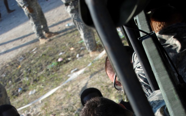 2-319th, Black Falcons, Deliver Much Needed Food and Water in Port-au-Prince