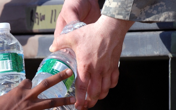 2-319th, Black Falcons, Deliver Much Needed Food and Water in Port-au-Prince