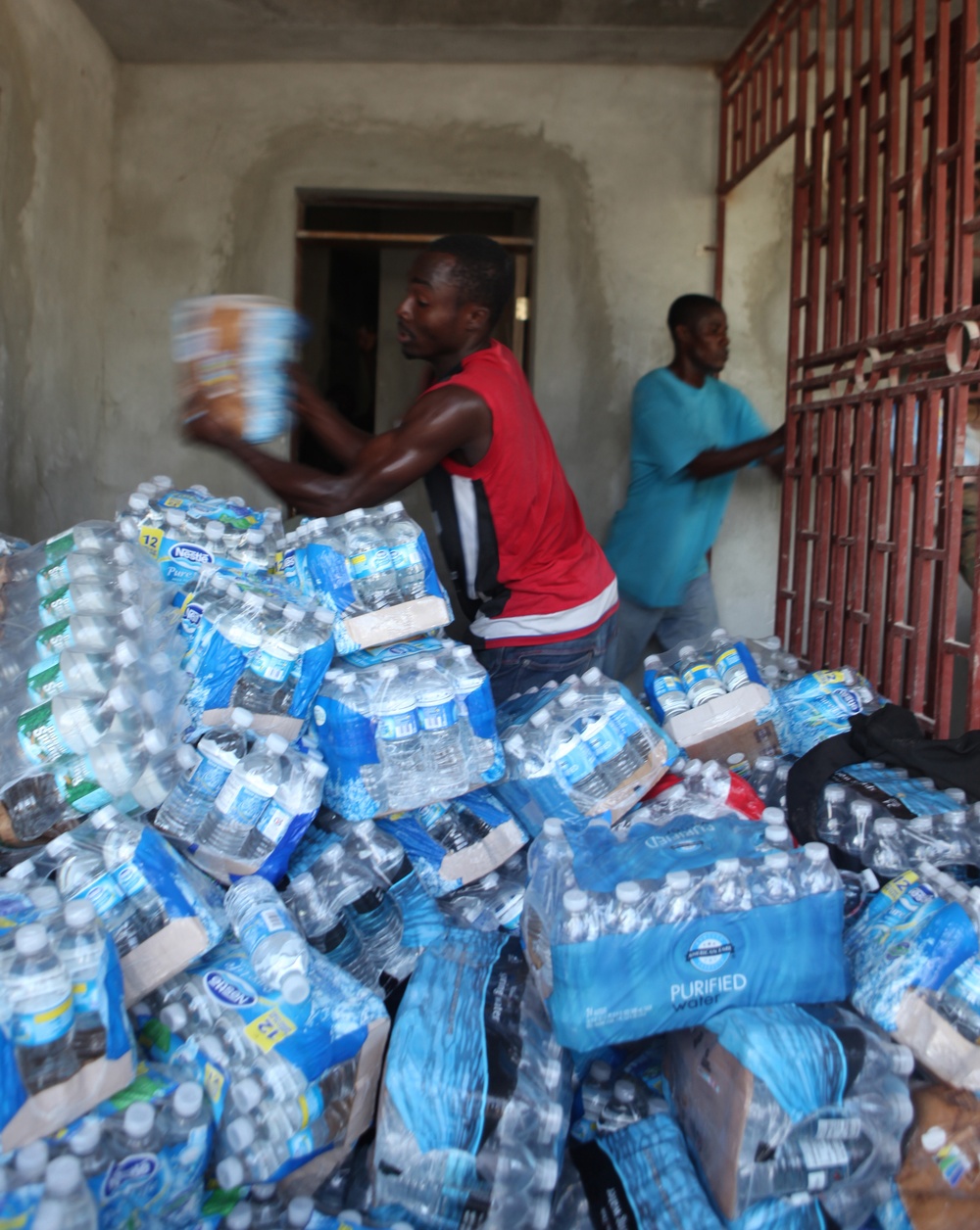 22nd MEU delivers cases of water and food to a local non-government organization