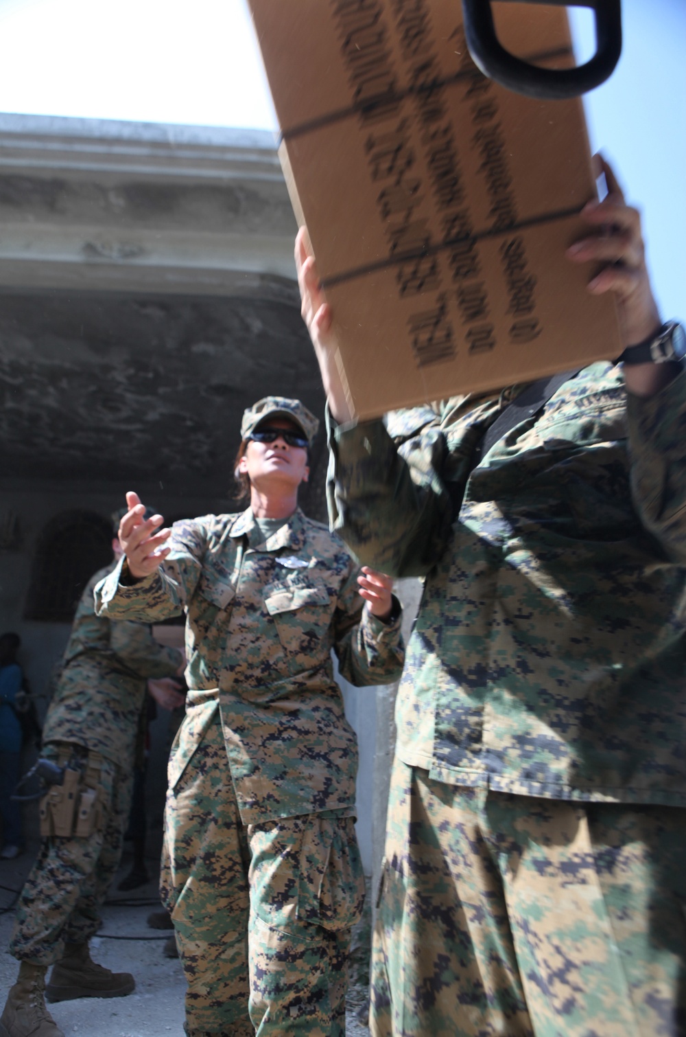22nd MEU delivers cases of water and food to a local non-government organization