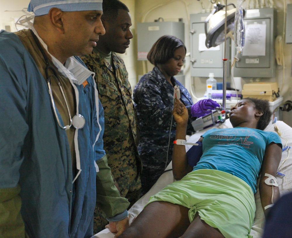 22nd MEU and USS Bataan treat injured Haitian woman