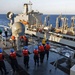 Sailors transfer supplies for relief mission