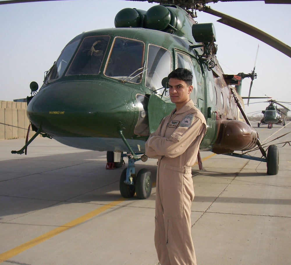 Iraqi gunners look out from above