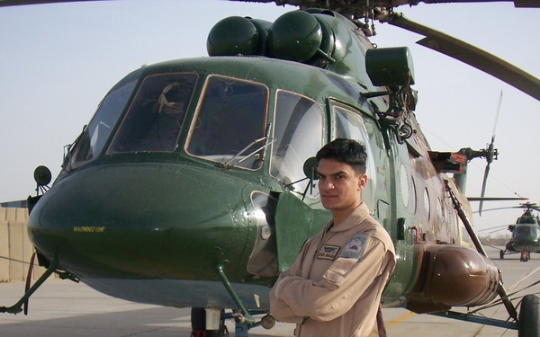 Iraqi gunners look out from above