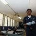 Petty Officer 2nd Class Kisha Wright Treats Patients