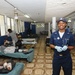 Petty Officer 2nd Class Kisha Wright Treats Patients