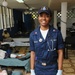 Petty Officer 2nd Class Kisha Wright Treats Patients