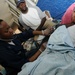 Petty Officer 2nd Class Kisha Wright Treats Patients