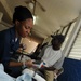 Petty Officer 2nd Class Kisha Wright Treats Patients