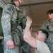 Instructors Coach Deployed Jumpmasters for Upcoming Parachute Jump