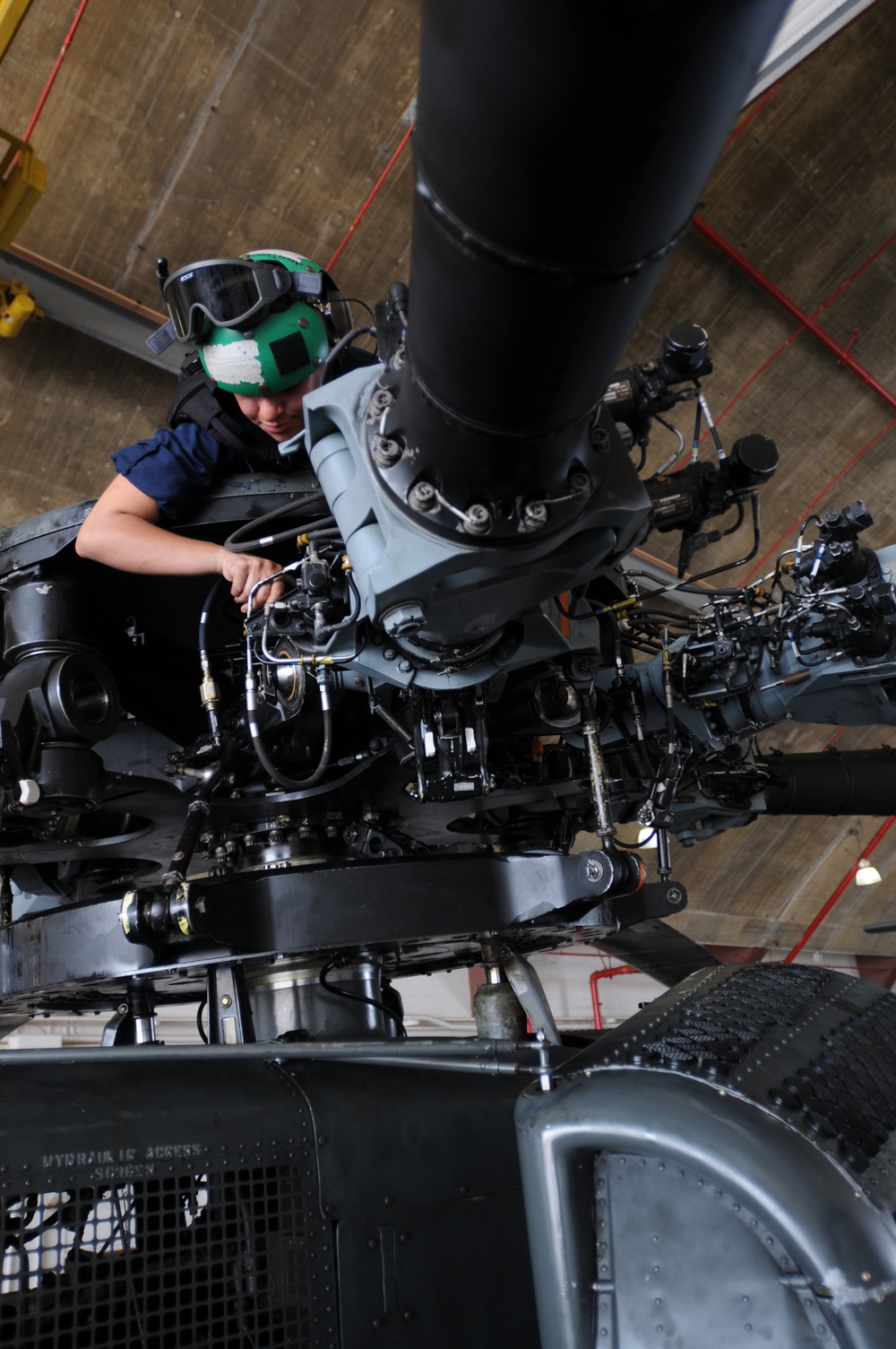 Sailor fixes helicopter used in Haiti relief efforts