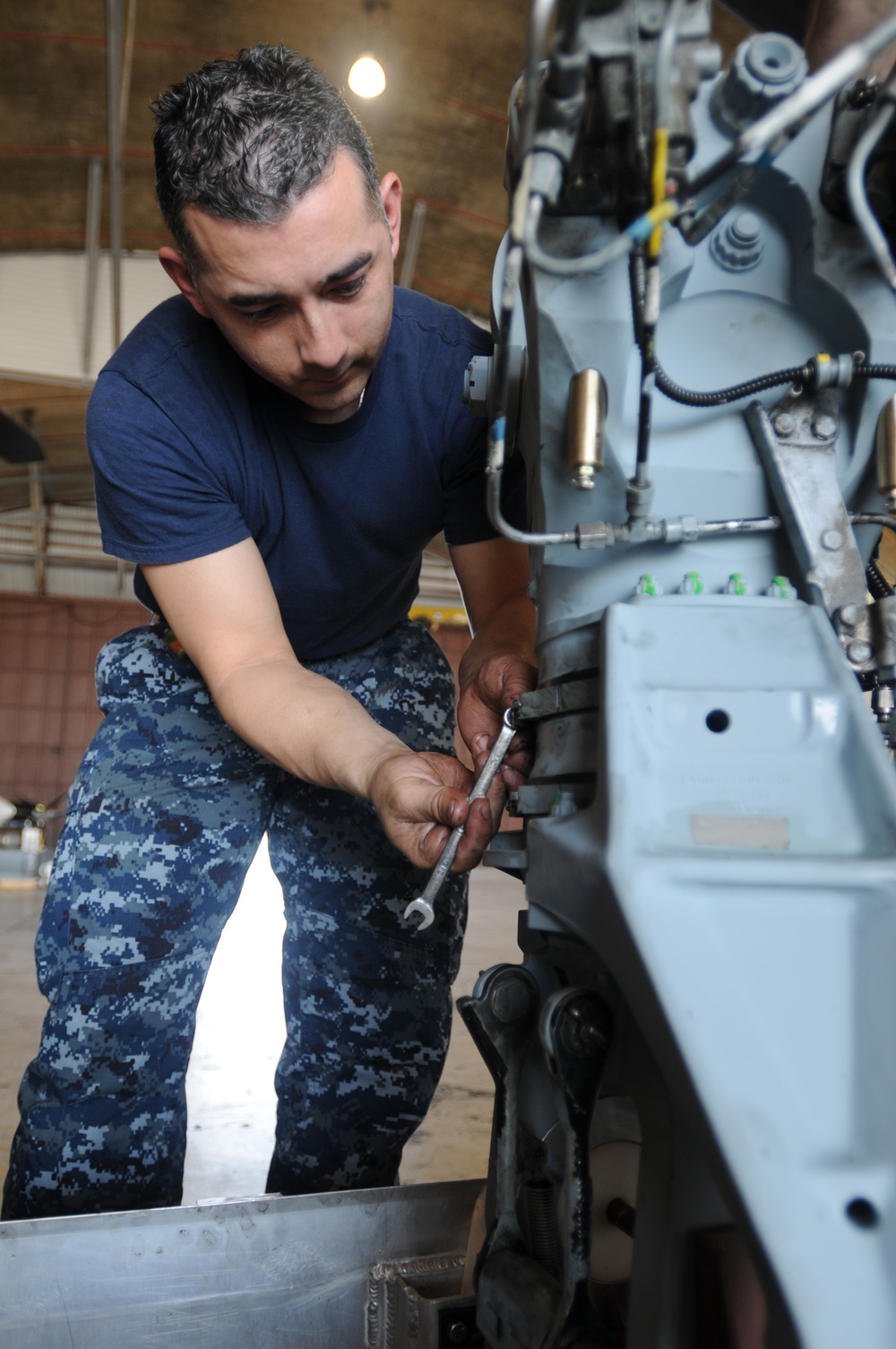 Sailor fixes helicopter used in Haiti relief efforts