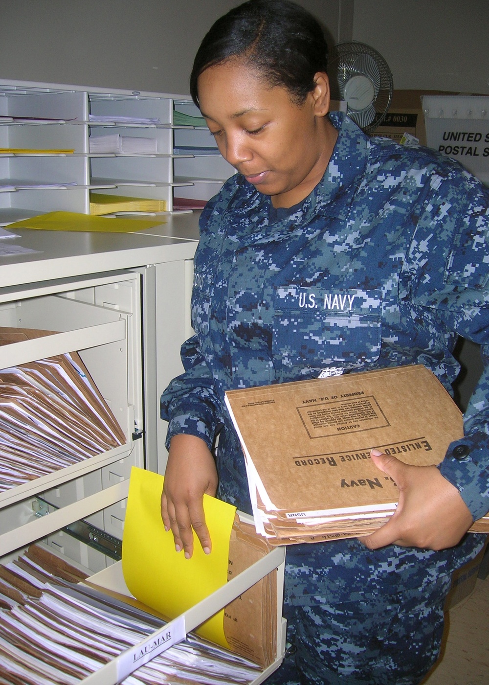 Navy personnel process records