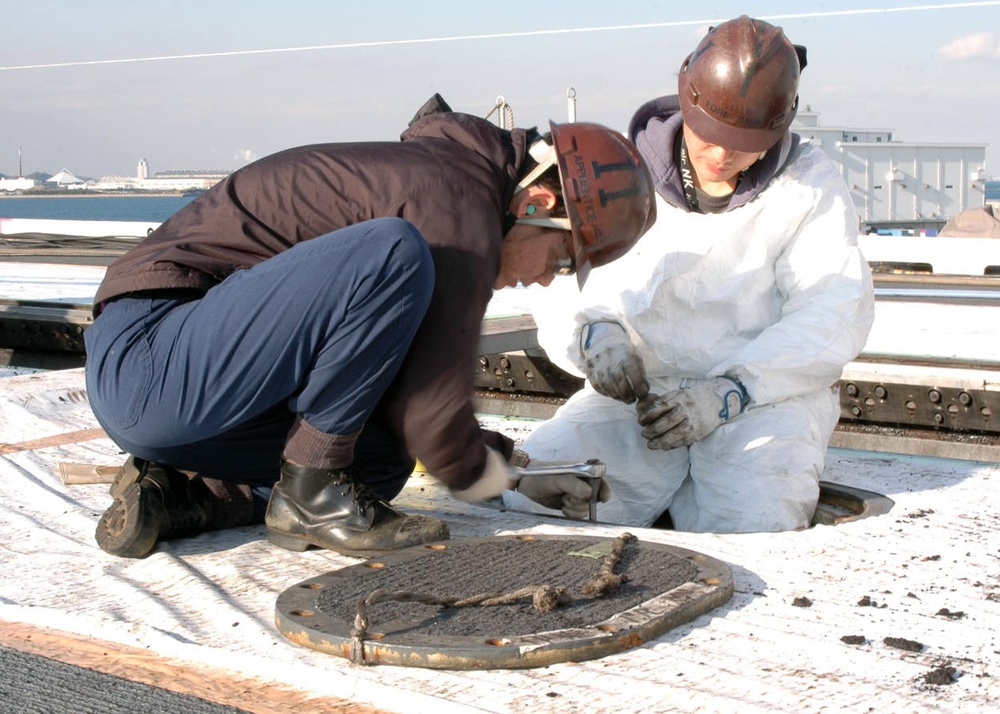 Sailors clean up USS George Washington