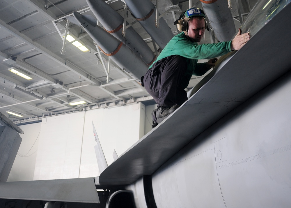 Sailors maintain jets, watch Super Bowl
