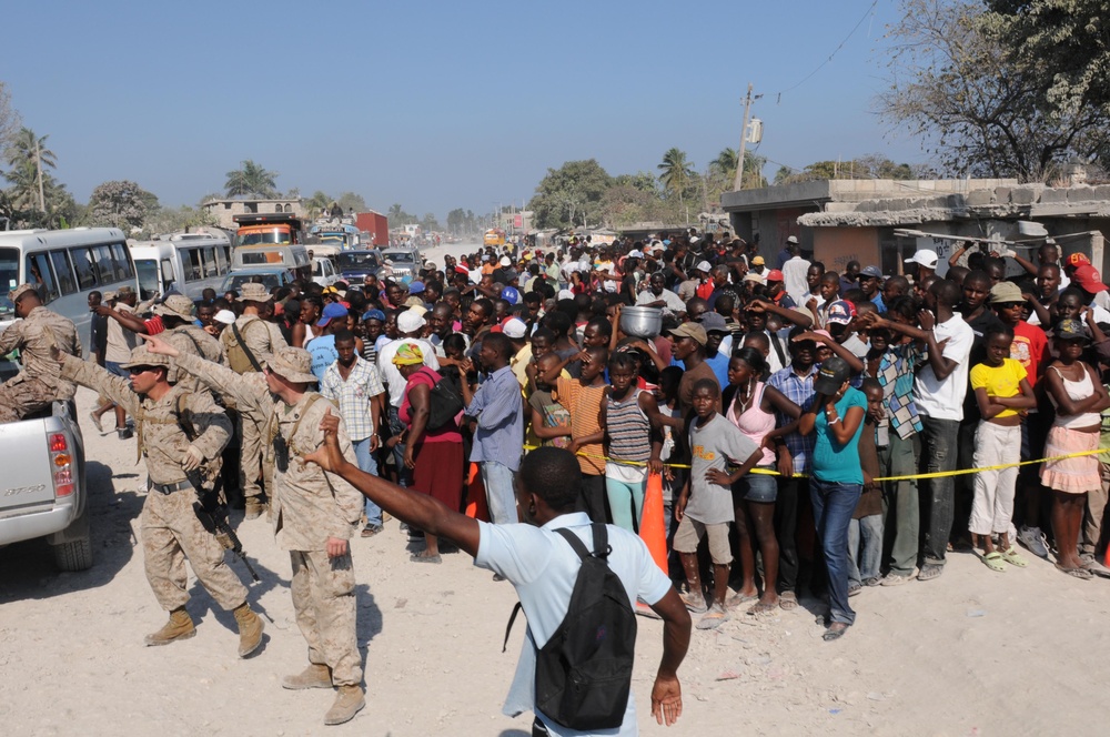 Marine and Navy personnel provide relief to Haitians in Carrefour