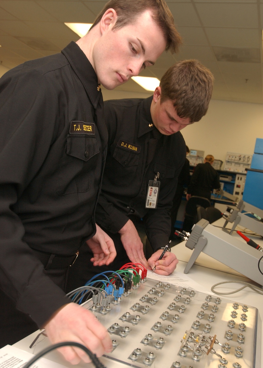 Naval Academy Midshipmen work on laboratory assignments