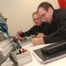 Naval Academy Midshipmen work on laboratory assignments