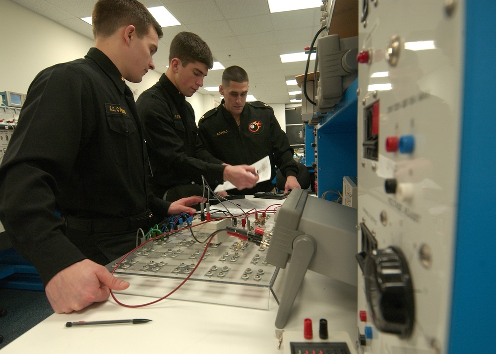 Naval Academy Midshipmen work on laboratory assignments