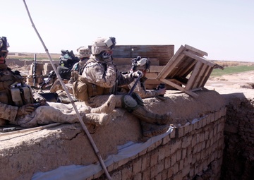 Marines Fight Insurgents, Secure Key Intersection on Road to Marjah