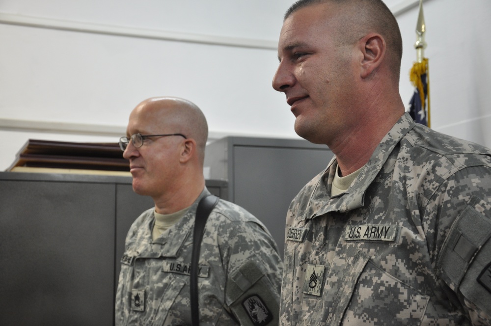 Deployed Soldiers share promotion ceremony with family members