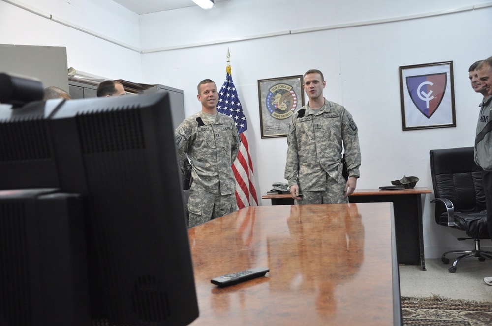 Deployed Soldiers share promotion ceremony with family members