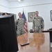 Deployed Soldiers share promotion ceremony with family members