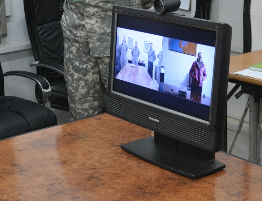 Deployed Soldiers share promotion ceremony with family members