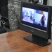 Deployed Soldiers share promotion ceremony with family members