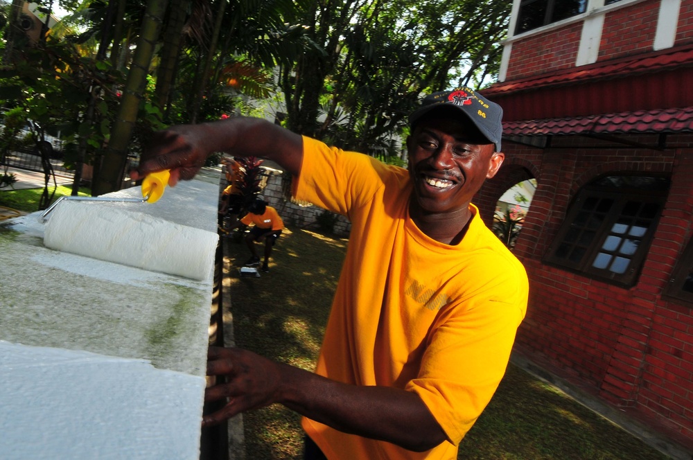 Sailors work in Malaysia