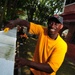 Sailors work in Malaysia
