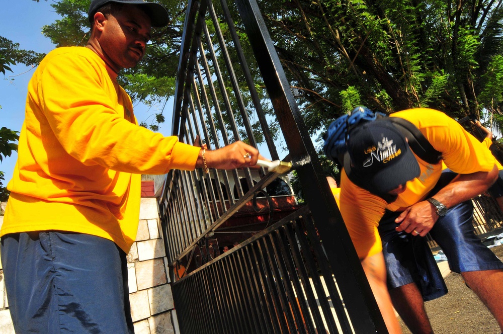 Sailors work in Malaysia