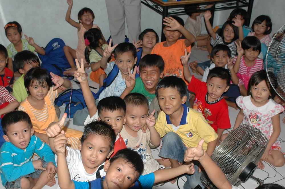 Sailors work in Malaysia