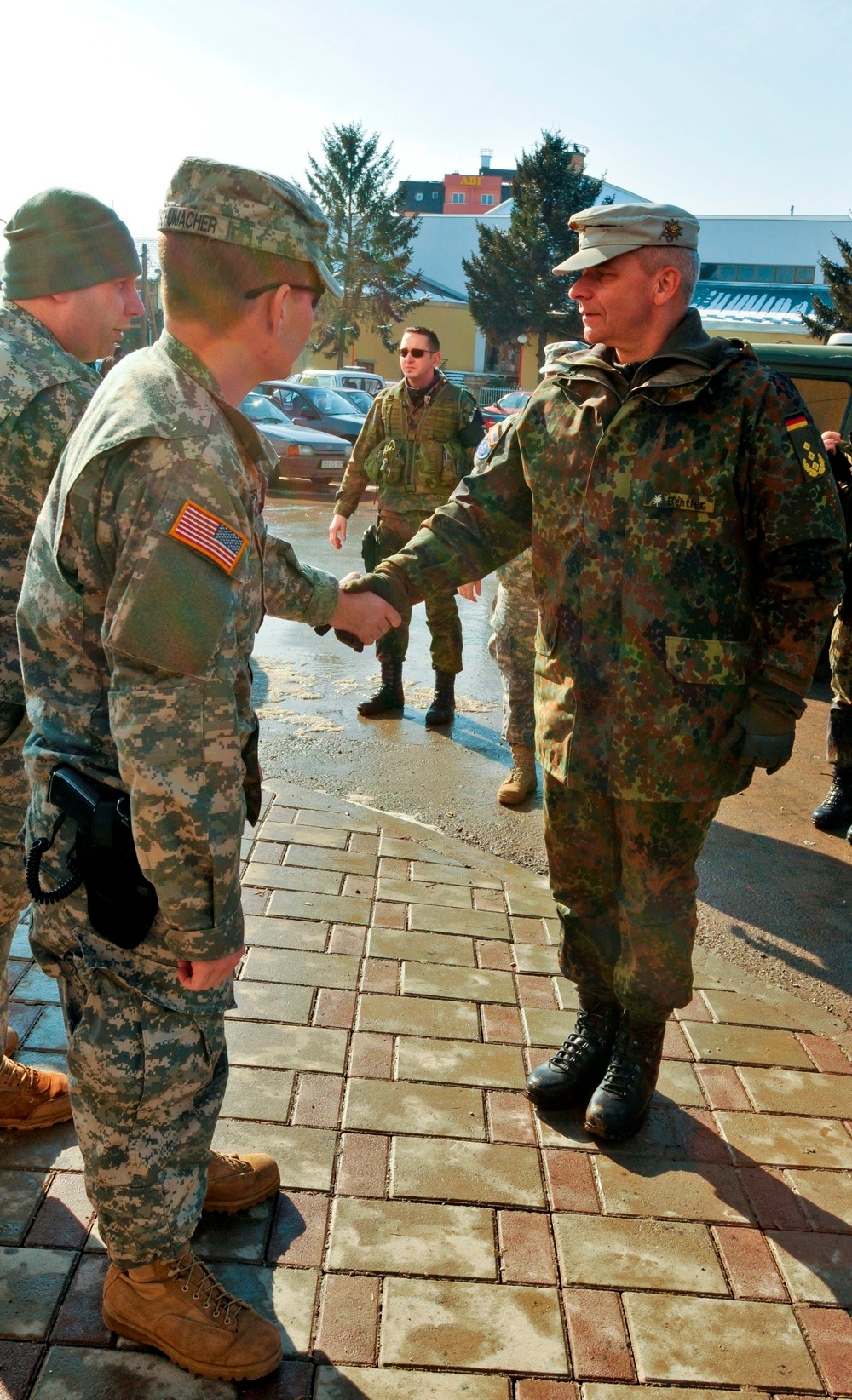 Kosovo Forces commander receives briefing from Multi-National Battle Group - East Liaison and Monitoring Team