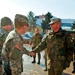 Kosovo Forces commander receives briefing from Multi-National Battle Group - East Liaison and Monitoring Team