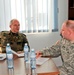 Kosovo Forces commander receives briefing from Multi-National Battle Group - East Liaison and Monitoring Team