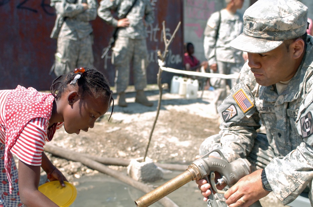 Soldiers bring fresh, clean water to Haiti