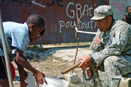 Soldiers bring fresh, clean water to Haiti
