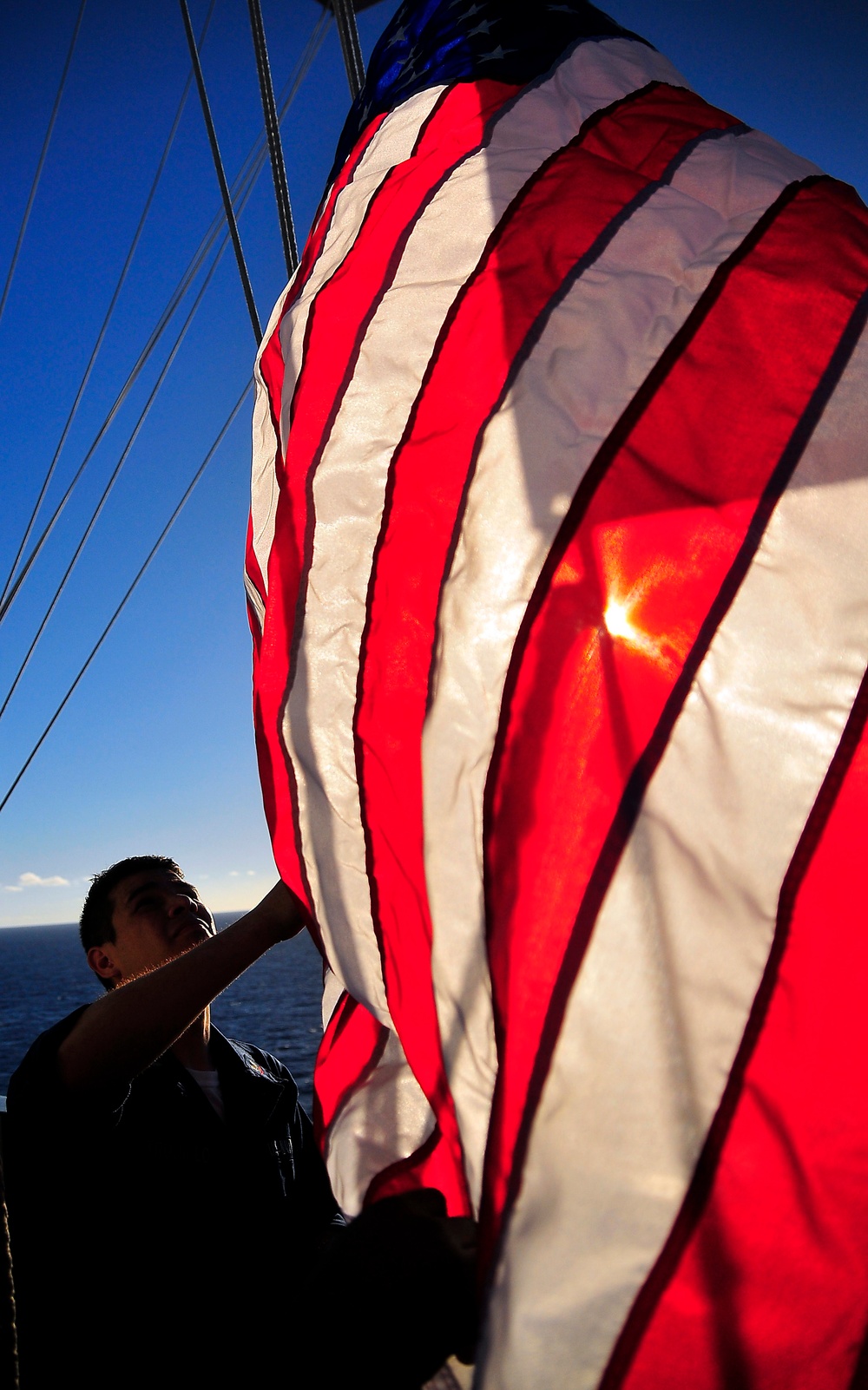 the national ensign aboard USS Carl Vinson