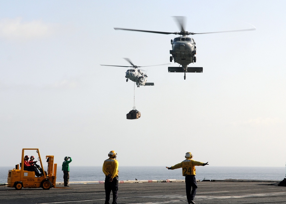 Helicopters operate aboard USS Dwight D. Eisenhower