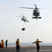 Helicopters operate aboard USS Dwight D. Eisenhower