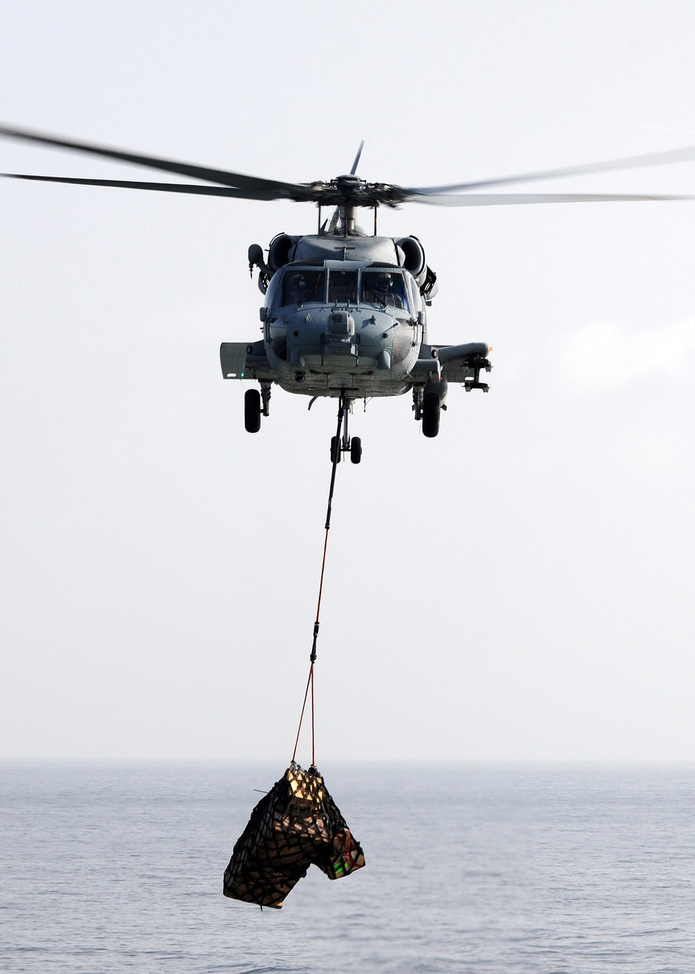 Helicopters operate aboard USS Dwight D. Eisenhower