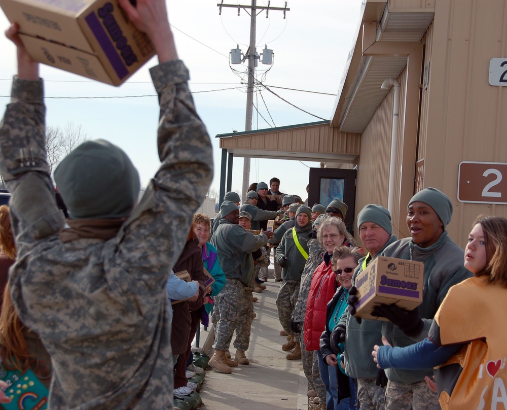 Girl Scouts Donate Cookies to Troops