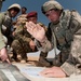 U.S., Iraqi artillerymen send live shells downrange