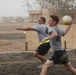 U.S. Soldiers from 2-23 Infantry Regiment play a volleyball game on Camp Taji