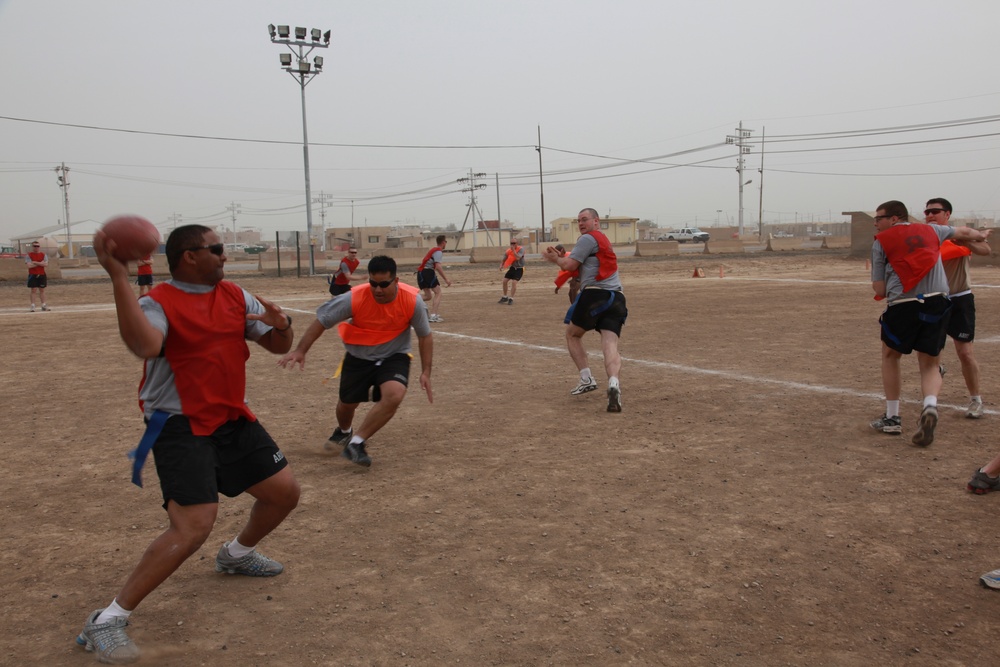 U.S. Soldiers from 2-23 Infantry Regiment play a volleyball game on Camp Taji